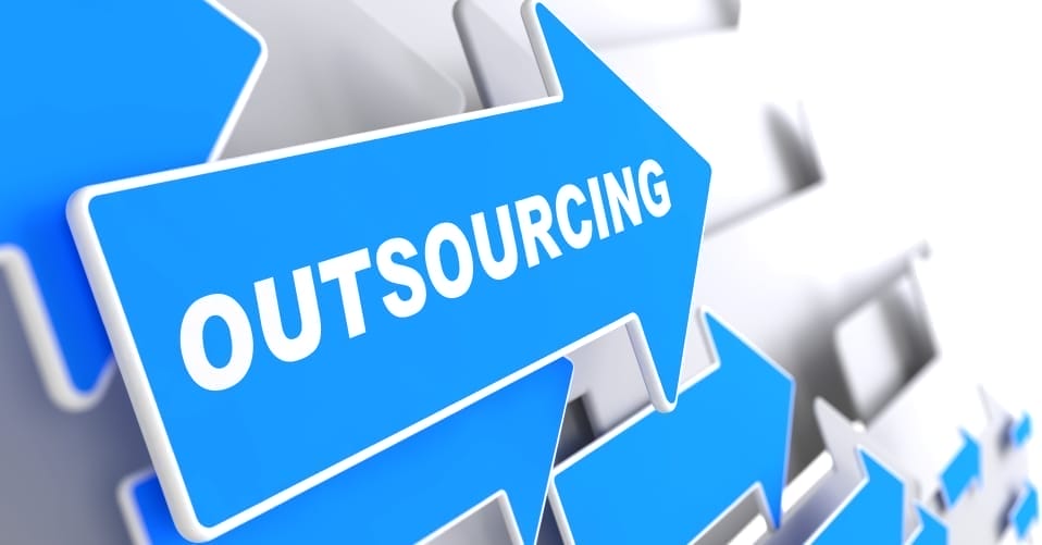 10 Reasons explain why we should use outsourcing solution 1 A blue arrow with the word Outsourcing written on it, pointing to the right. The arrow overlaps other blurred blue arrows, creating a sense of movement and direction. The background is a gradient of white and light gray.
