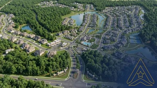 Civil Engineering Outsourcing Aerial view of suburb with winding roads and homes. Outsourced civil engineering project shows ponds, green space, logo bottom right.